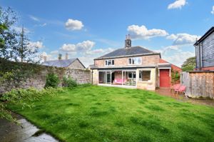 Farley Cottage rear elevation and garden- click for photo gallery
